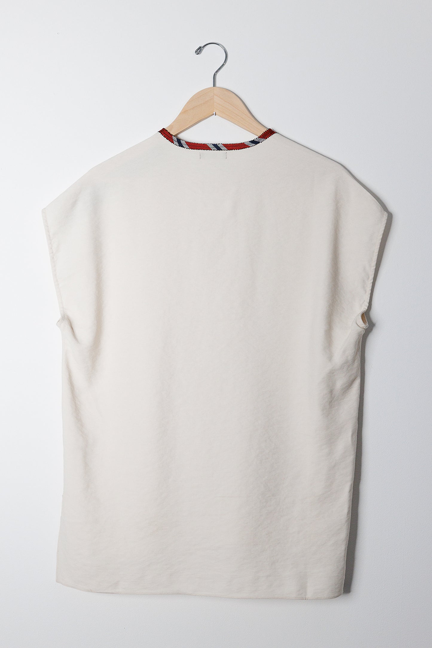 SLEEVELESS SIDE ZIP TOP