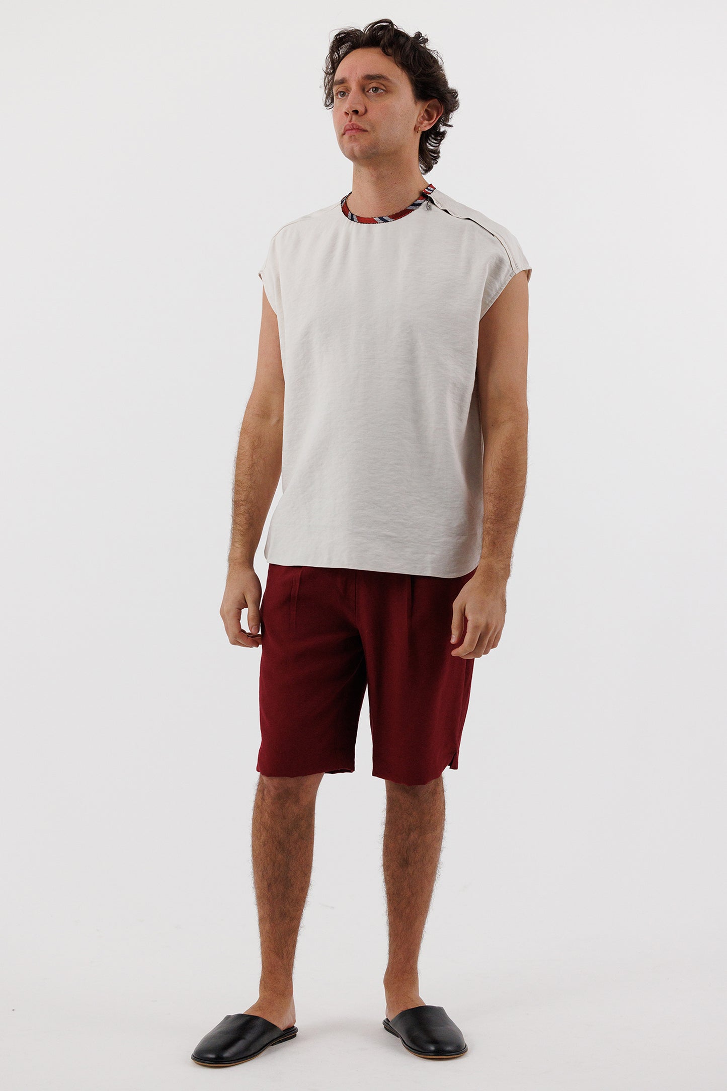 SLEEVELESS SIDE ZIP TOP
