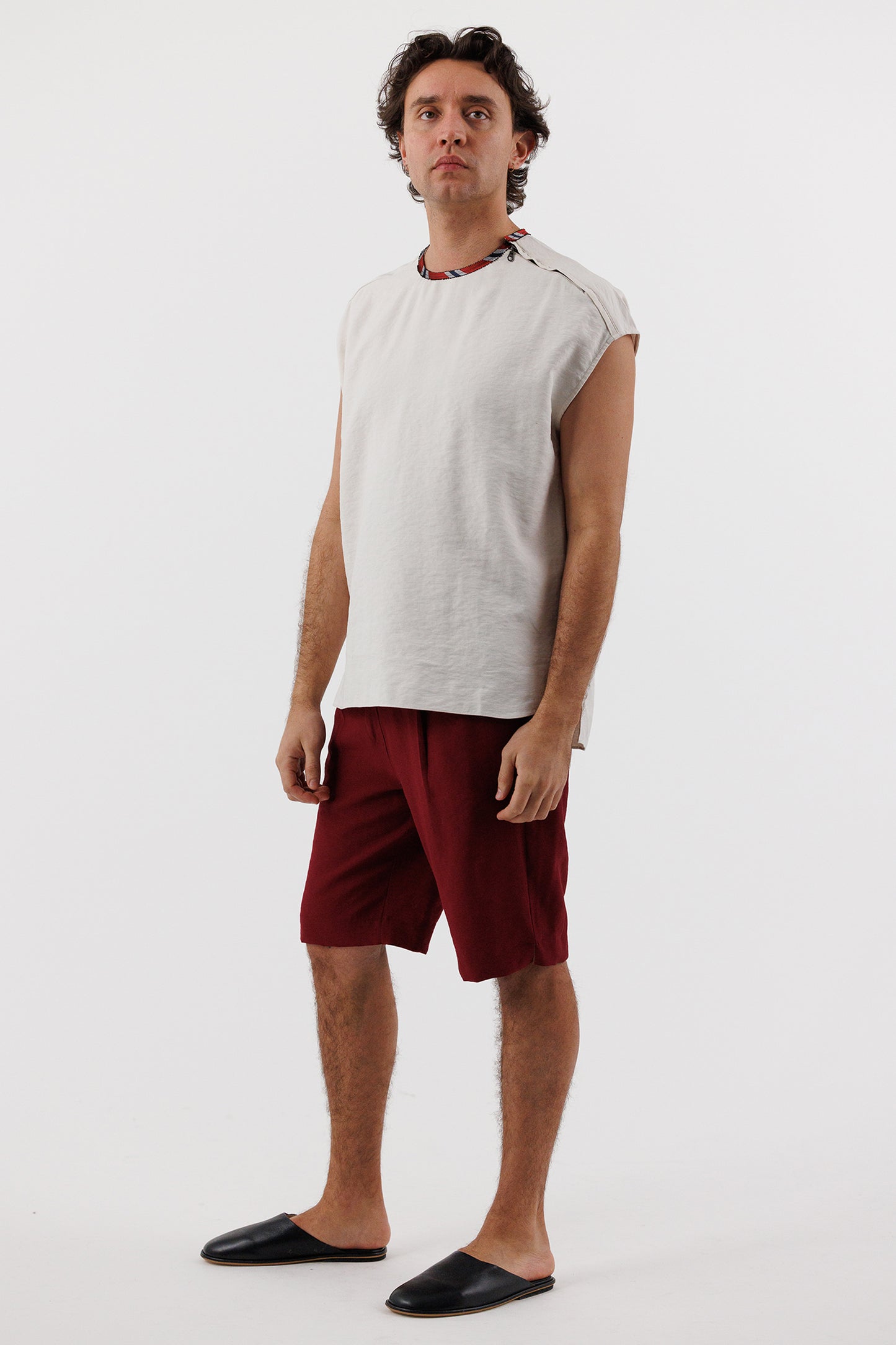 SLEEVELESS SIDE ZIP TOP